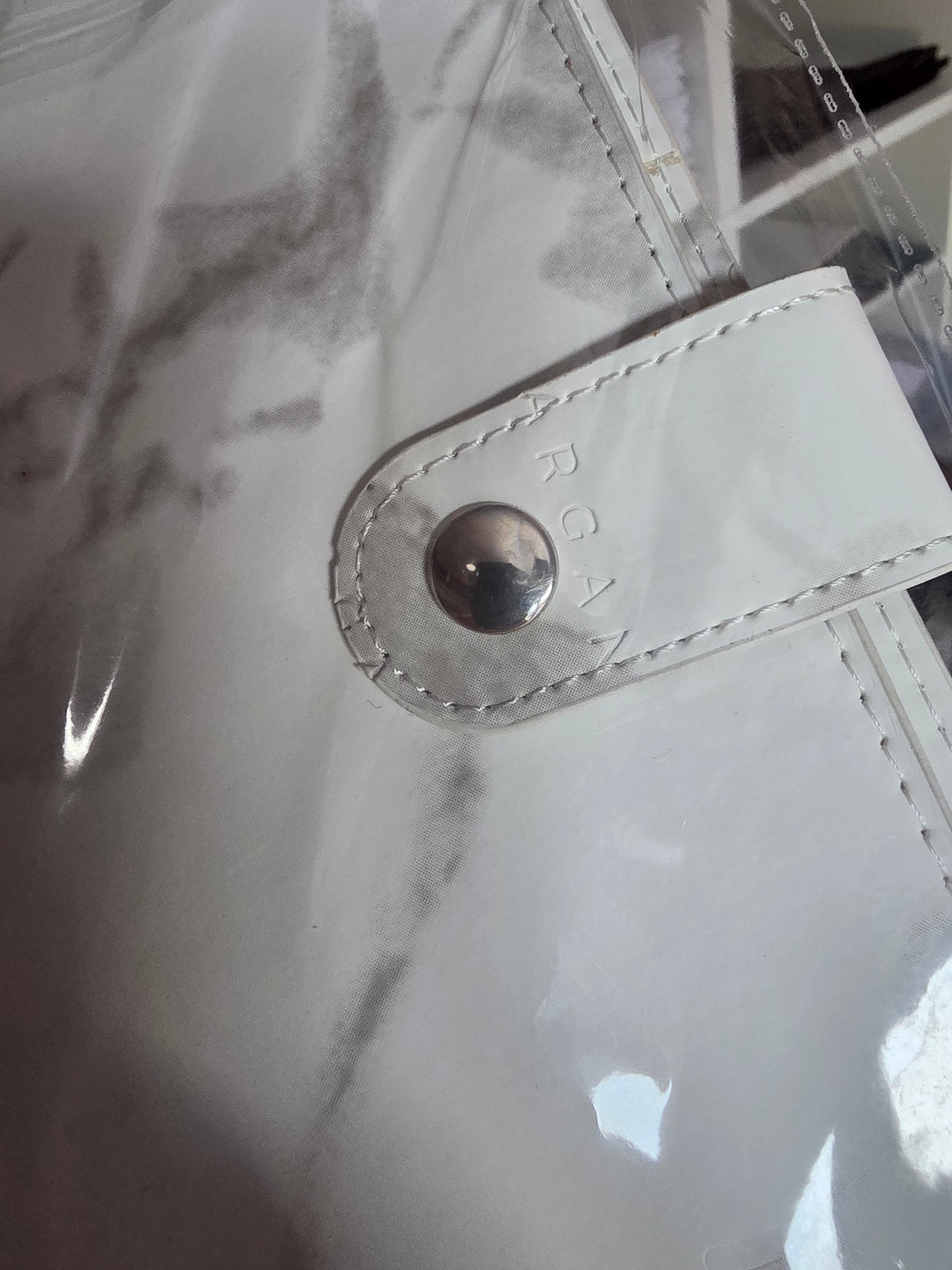 Close-up of the cosmetic stamped imperfection on a discounted Roarganiser planner organiser.